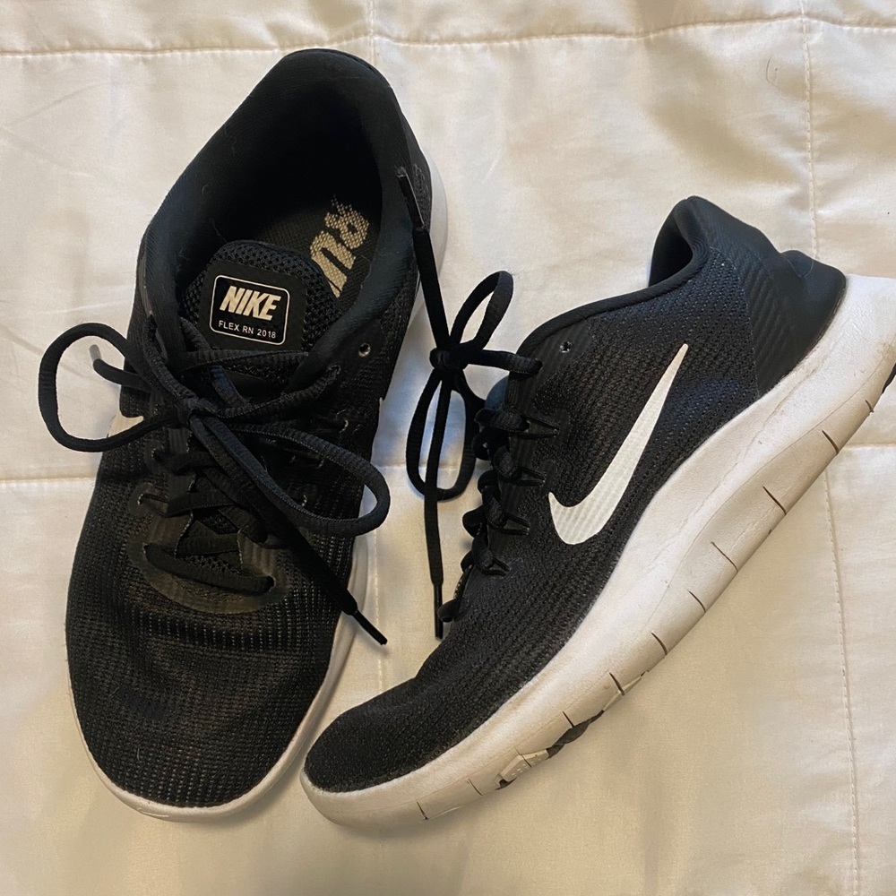 Black Nike running shoes